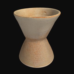 beige textured ceramic sculpture with wider rounded top