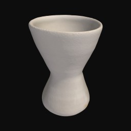 white textured ceramic sculpture with wider rounded top
