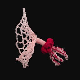 pink and red knitted jellyfish sculpture