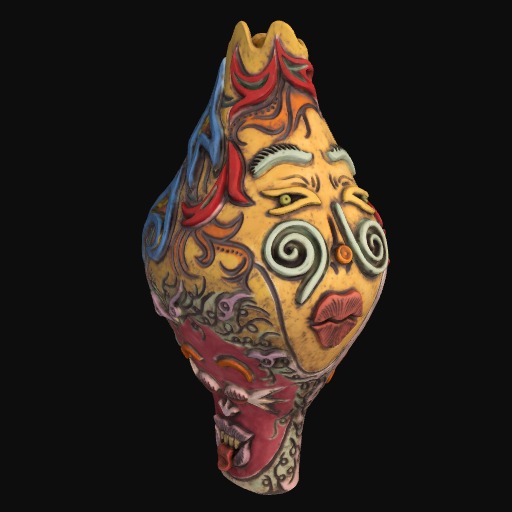 colourful ceramic vase depicting an animated face with spirals for eyes