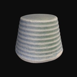 textured blue and white ceramic sculpture with rounded coil detail