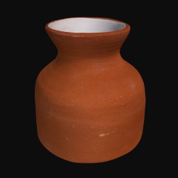 textured orange ceramic sculpture with rounded opening at the top