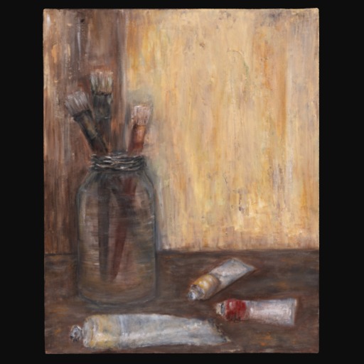 paintbrushes in clear jar and paint scattered on textured background