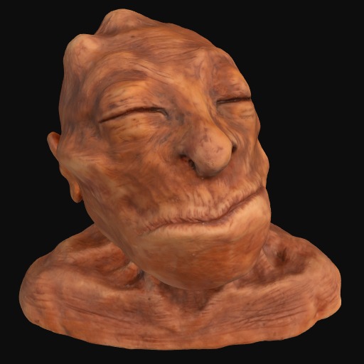 Orange sculpture of a face with its eyes and mouth 'webbed' shut