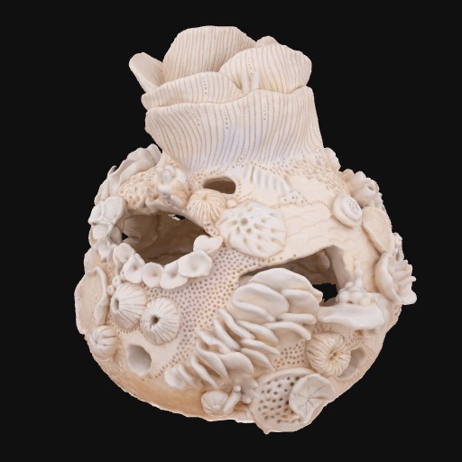 close-up bleached coral ceramic form, curved lines and rounded textural features.