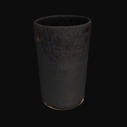 black textured ceramic sculpture shaped like a cup