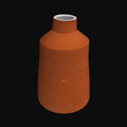 orange ceramic sculpture with small rounded top