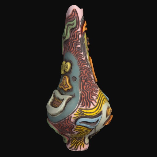 colourful ceramic vase depicting an animated face with a large open mouth