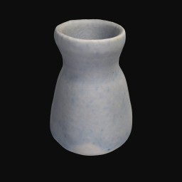 grey textured ceramic sculpture with round opening