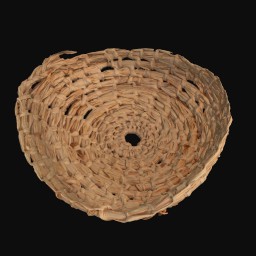 Small woven basket with hole in the centre