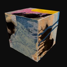 cube printed with abstract blue, black, yellow and pink painting