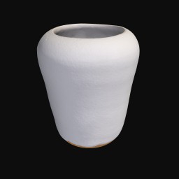white ceramic sculpture with round opening at the top