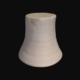 beige textured ceramic sculpture with wider bottom