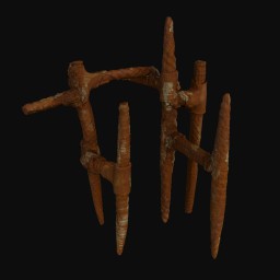 brown clay sculpture made of long thin rusted spikes