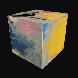 cube printed with abstract yellow, blue and pink painting