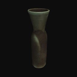 dark green textured ceramic sculpture with rounded opening