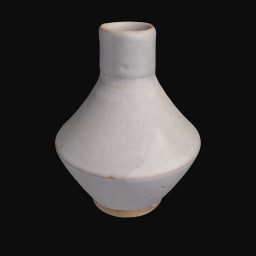 white textured ceramic sculpture with wide base and narrow top