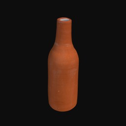 orange ceramic sculpture shaped like a bottle