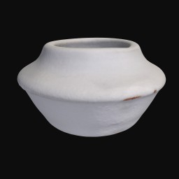 white ceramic sculpture with large round opening