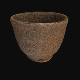 brown textured grainy ceramic sculpture shaped like a bowl