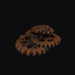 three stacked rusty coloured cog scultpures