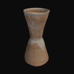 beige textured ceramic sculpture with rounded top