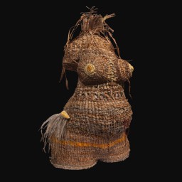 Woven sculpture of headless womans torso with feathers on neck and hips